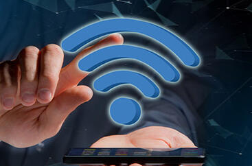 palec dotykający symbolu sieci wifi