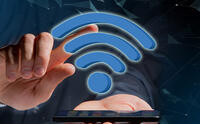 palec dotykający symbolu sieci wifi